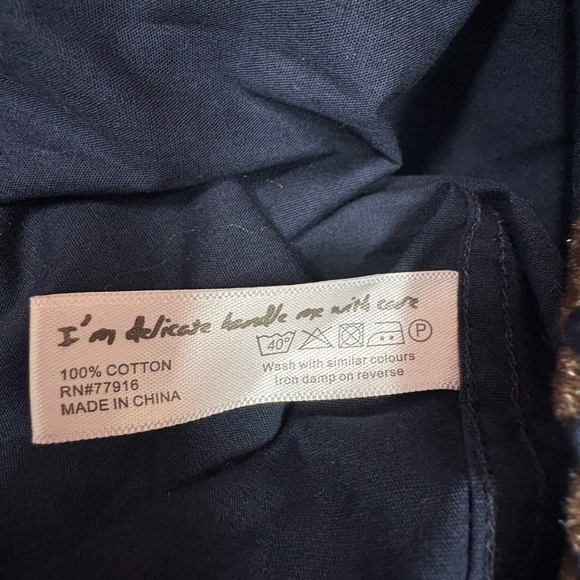 1 … LIKE NO OTHER Button down - Picture 13 of 13